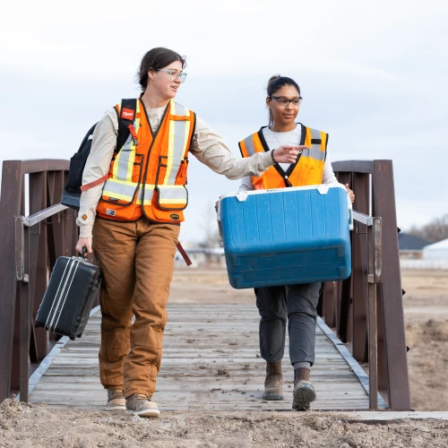 Environmental field teams coordinating site investigations and sample collection in remote locations.