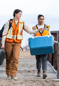 Environmental field teams coordinating site investigations and sample collection in remote locations.